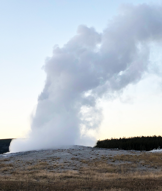 Old Faithful at dusk